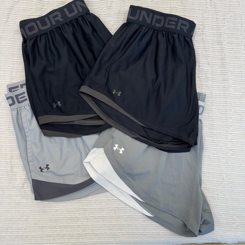 4 Pairs of Under Armour Women’s Shorts all size 1X.